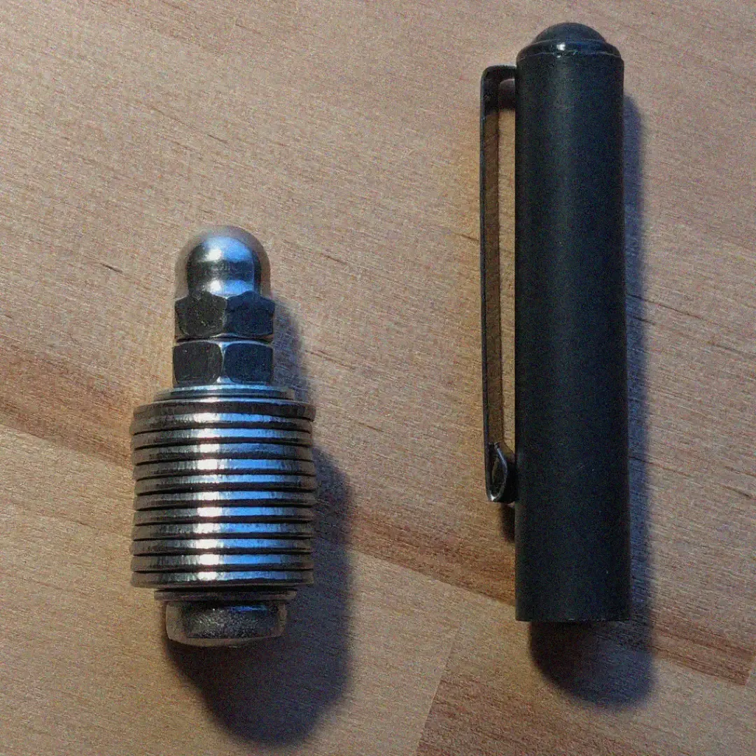 A set of stainless steel bolts, nuts and washers, all put together to form the backup